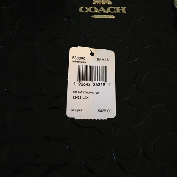 NWT. Coach
SIGNATURE LEATHER ZIP TOP TOTE - Picture 4 of 6